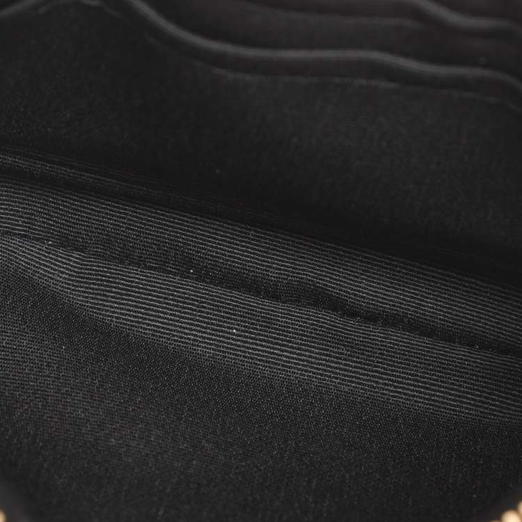 Pre Owned Coach Black Signature Debossed Patent Leather Wristlet