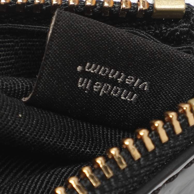 Pre Owned Coach Black Signature Debossed Patent Leather Wristlet