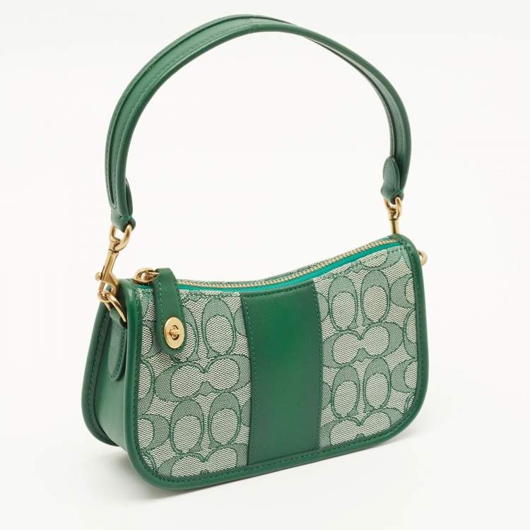 Pre Owned Coach Swinger 20 Green Signature Canvas and Leather Bag