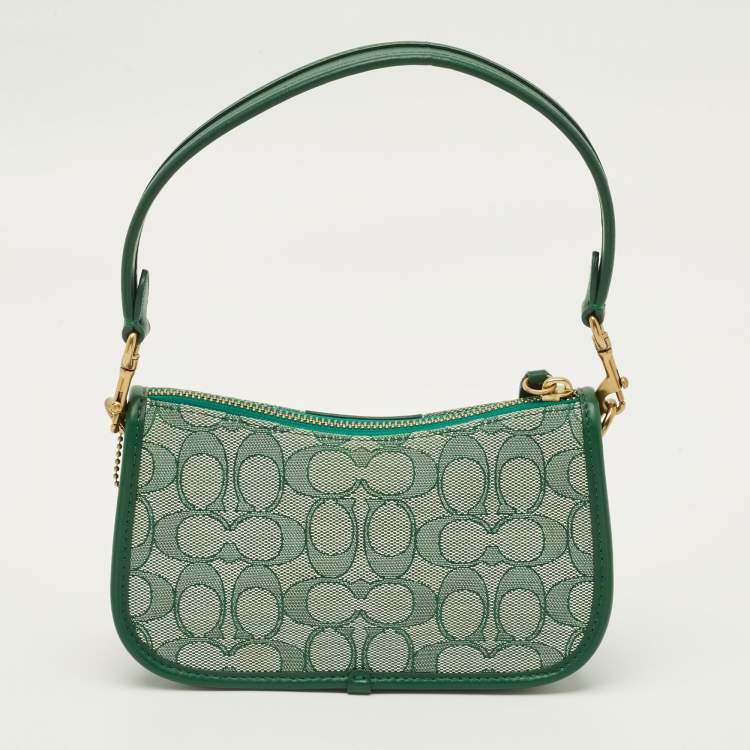 Pre Owned Coach Swinger 20 Green Signature Canvas and Leather Bag
