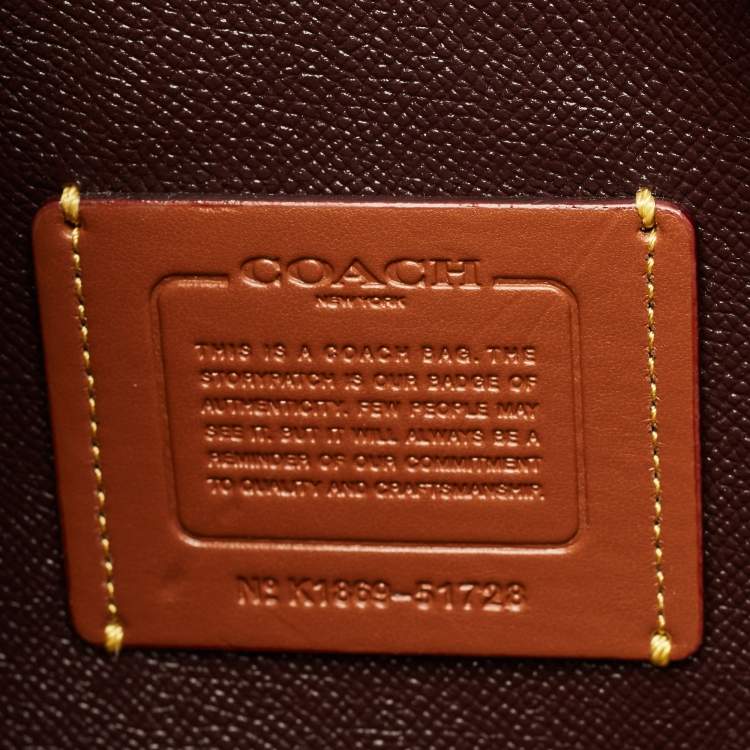 Pre Owned Coach Charlie Carryall Black Signature Embossed Leather Tote