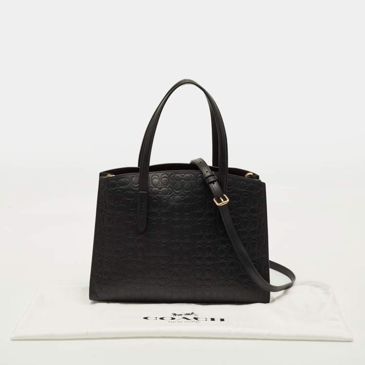 Pre Owned Coach Charlie Carryall Black Signature Embossed Leather Tote