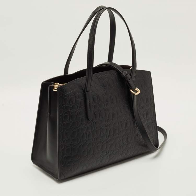 Pre Owned Coach Charlie Carryall Black Signature Embossed Leather Tote