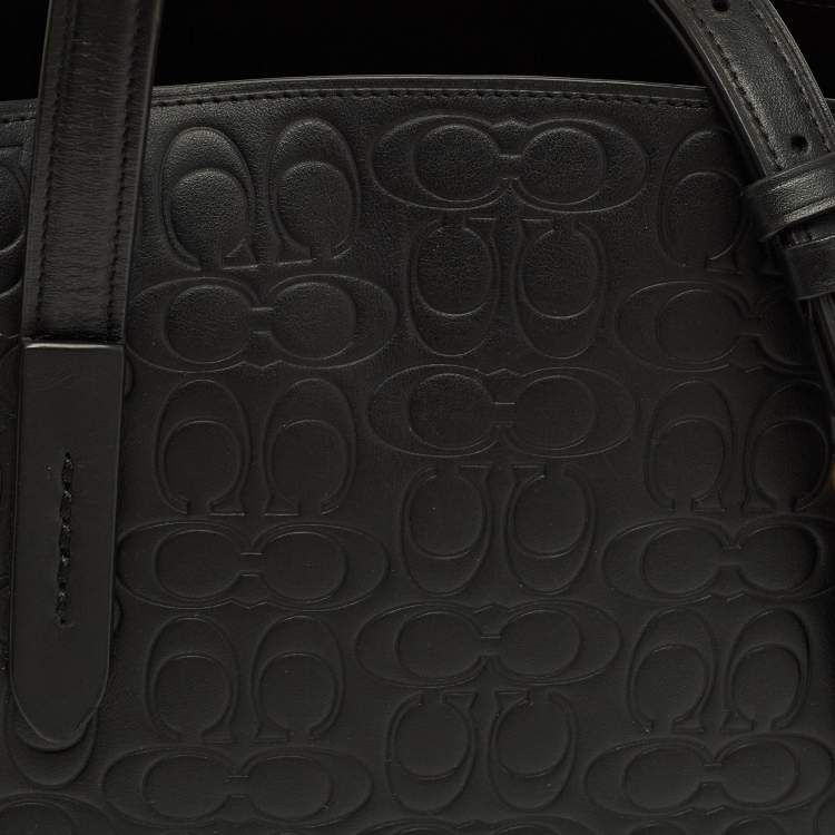 Pre Owned Coach Charlie Carryall Black Signature Embossed Leather Tote