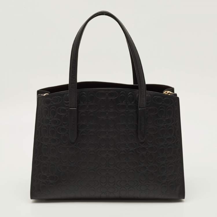 Pre Owned Coach Charlie Carryall Black Signature Embossed Leather Tote