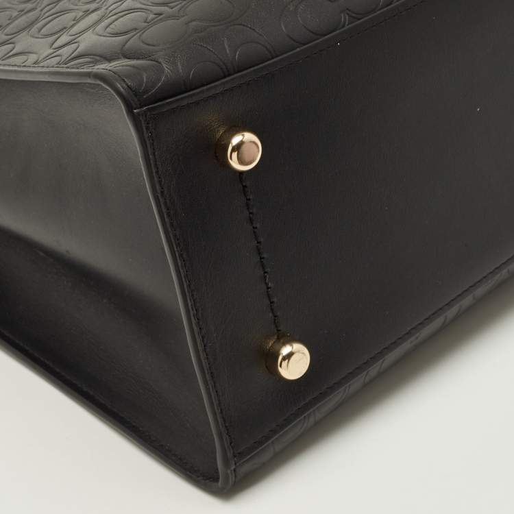 Pre Owned Coach Charlie Carryall Black Signature Embossed Leather Tote