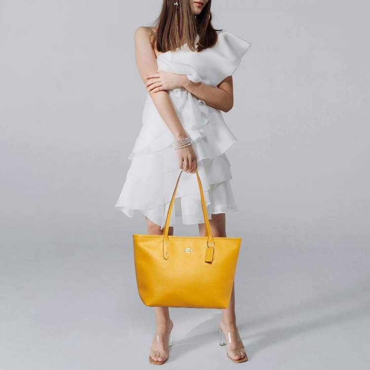 Pre Owned Coach City Yellow Leather Zip Shopper Tote
