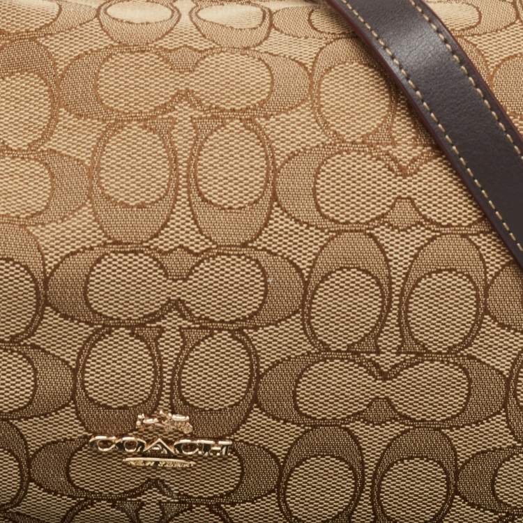 Pre Owned Coach Beige Signature Canvas East West Celeste Hobo