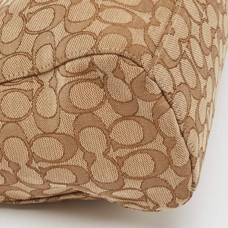 Pre Owned Coach Beige Signature Canvas East West Celeste Hobo