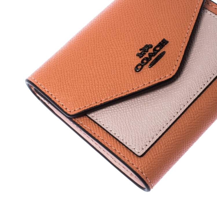 Pre Owned Coach Pastel Orange/Pink Leather Colorblock Trifold Wallet 