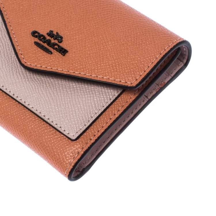 Pre Owned Coach Pastel Orange/Pink Leather Colorblock Trifold Wallet 