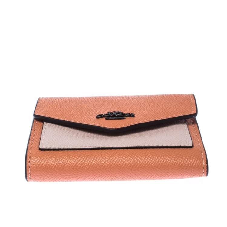 Pre Owned Coach Pastel Orange/Pink Leather Colorblock Trifold Wallet 