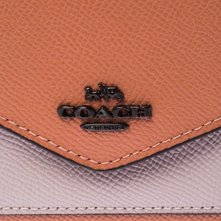 Pre Owned Coach Pastel Orange/Pink Leather Colorblock Trifold Wallet 