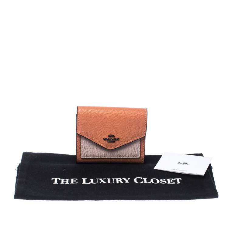 Pre Owned Coach Pastel Orange/Pink Leather Colorblock Trifold Wallet 