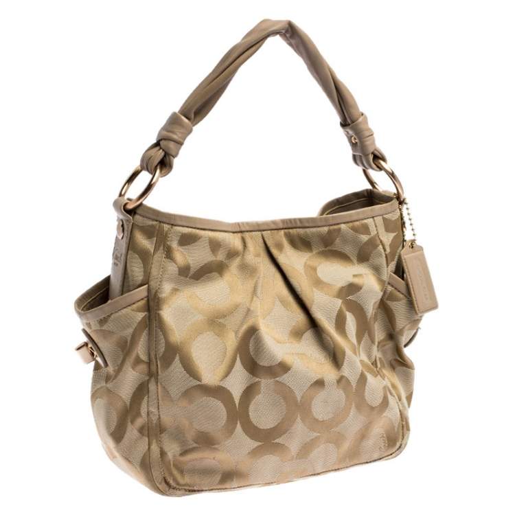 Pre Owned Coach Beige Canvas and Leather Op Art Parker Hobo