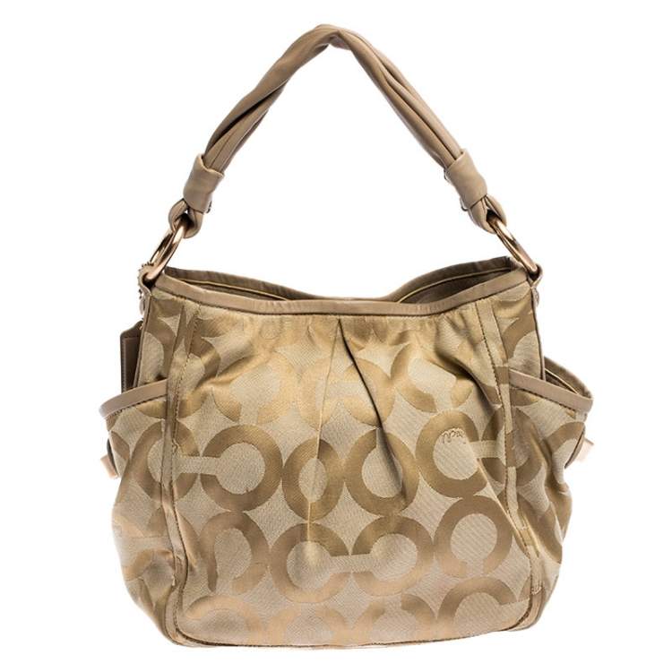 Pre Owned Coach Beige Canvas and Leather Op Art Parker Hobo