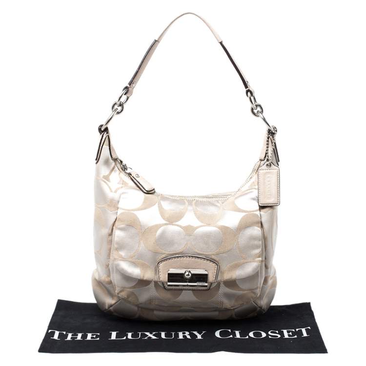Pre Owned Coach Beige Canvas and Leather Kristin Hobo 