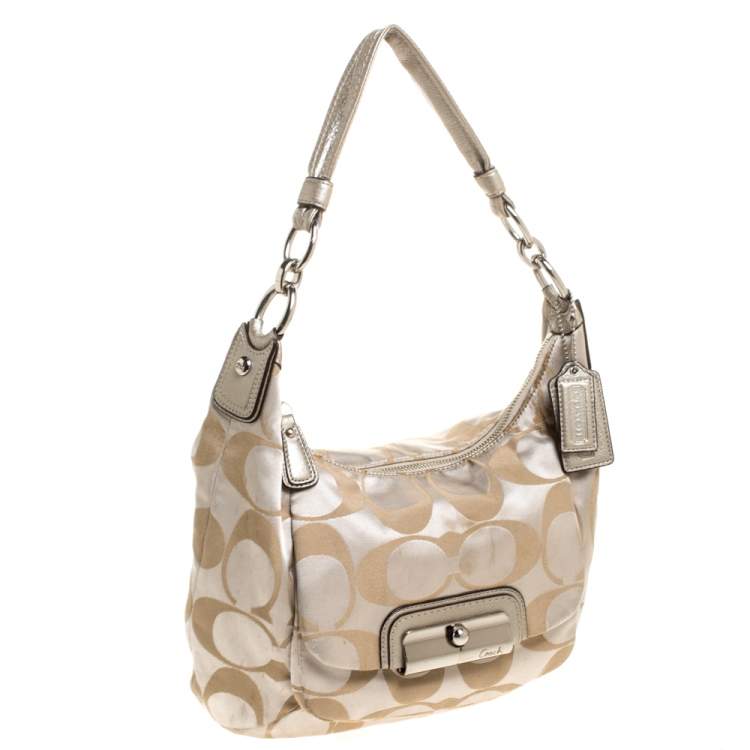 Pre Owned Coach Beige/Gold Canvas and Leather Kristin Hobo 