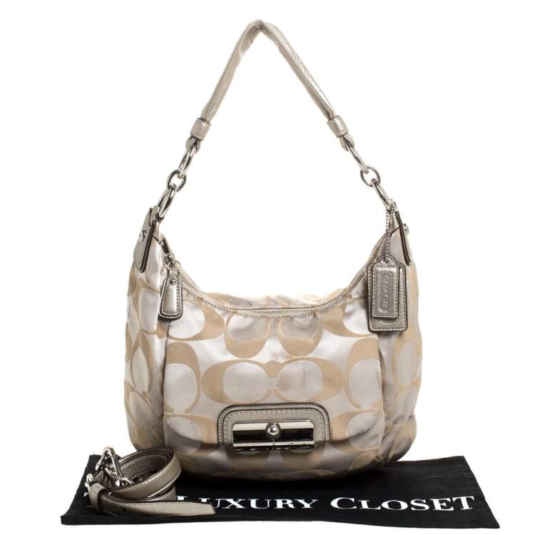 Pre Owned Coach Beige/Gold Canvas and Leather Kristin Hobo 