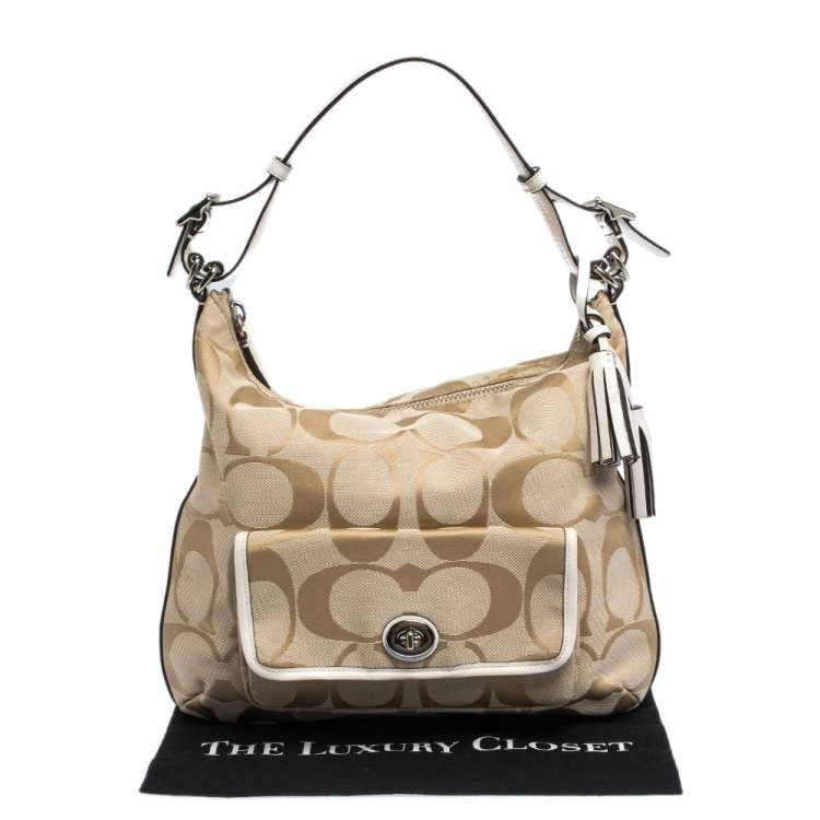 Pre Owned Coach Beige Signature Canvas and Leather Courtney Hobo  
