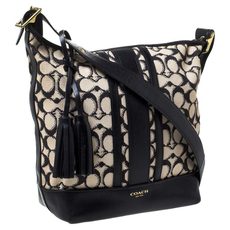 Pre Owned Coach Beige/Black Signature Canvas and Leather Hobo