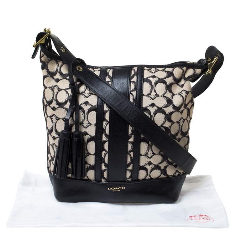 Pre Owned Coach Beige/Black Signature Canvas and Leather Hobo