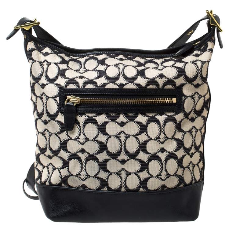 Pre Owned Coach Beige/Black Signature Canvas and Leather Hobo