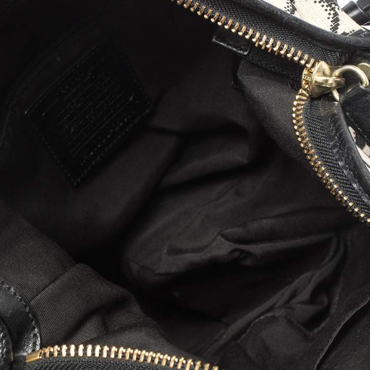 Pre Owned Coach Black/White Signature Canvas and Leather Tassel Hobo