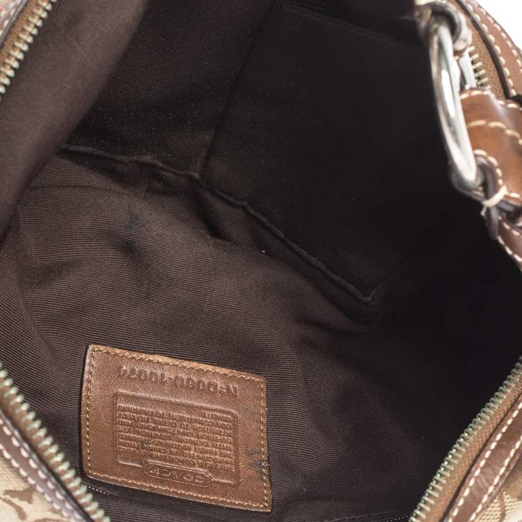 Pre Owned Coach Beige/Brown Signature Canvas and Leather Hobo