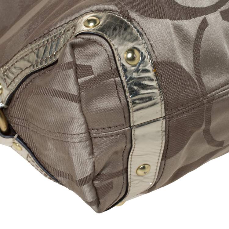 Pre Owned Coach Gold Signature Canvas and Patent Leather Carly Hobo