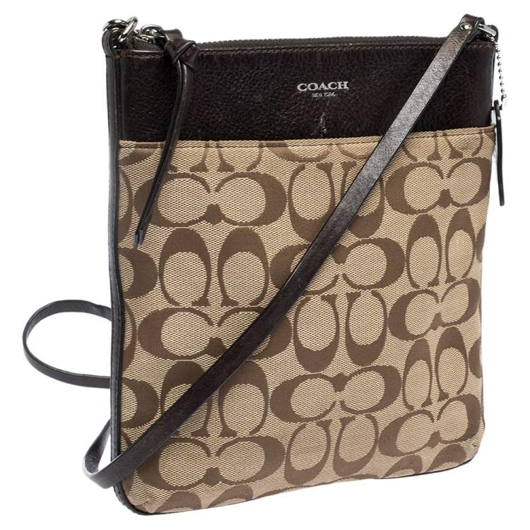 Pre Owned Coach Brown/Beige Signature Canvas and Leather Swingpack Crossbody Bag