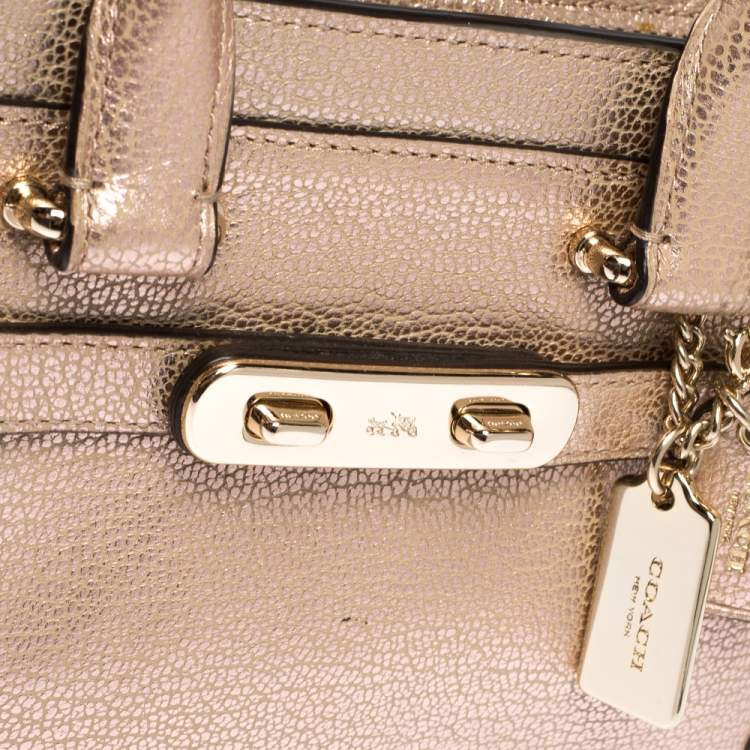 Pre Owned Coach Metallic Rose Gold Leather Swagger 27 Carryall Top Handle Bag