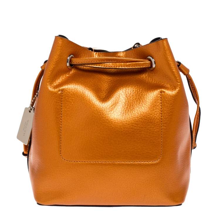 Pre Owned Coach Metallic Orange Leather Drawstring Crossbody Bag