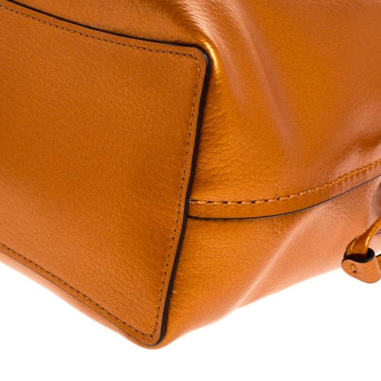 Pre Owned Coach Metallic Orange Leather Drawstring Crossbody Bag