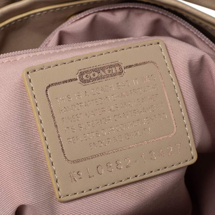 Pre Owned Coach Beige Canvas and Leather Op Art Parker Hobo