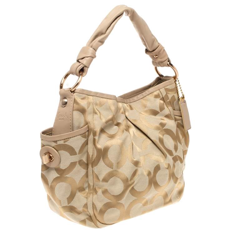 Pre Owned Coach Beige Canvas and Leather Op Art Parker Hobo