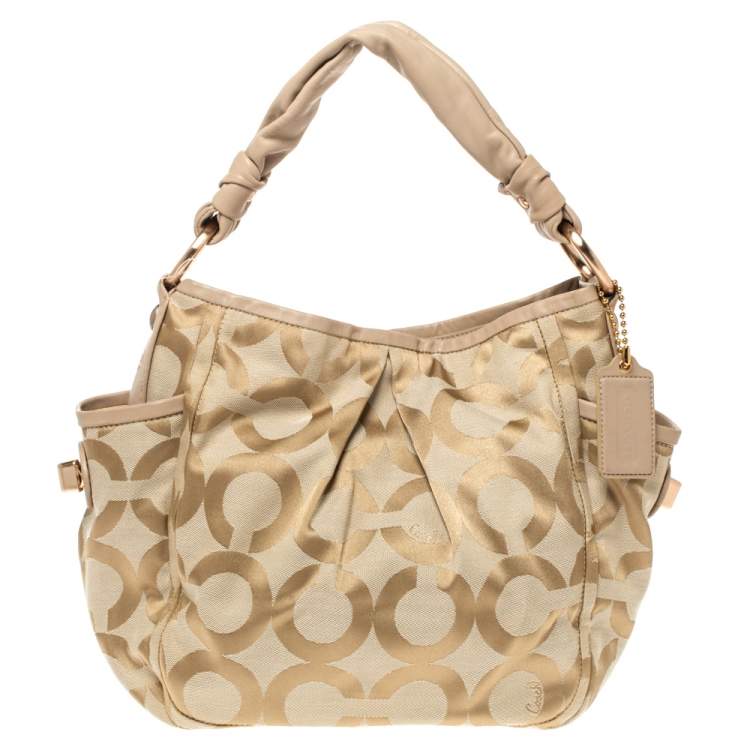 Pre Owned Coach Beige Canvas and Leather Op Art Parker Hobo