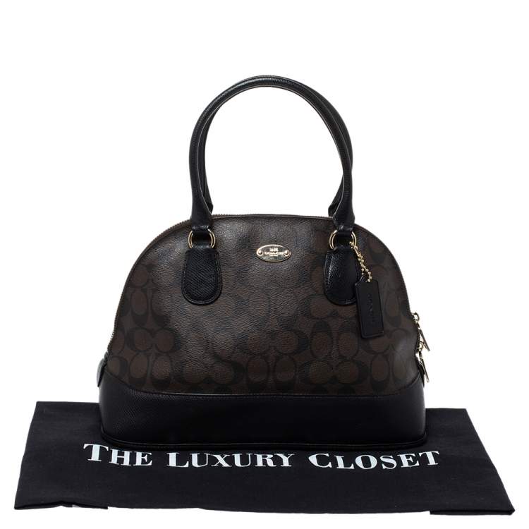 Pre Owned Coach Brown/Black Signature Coated Canvas and Leather Cora Domed Satchel