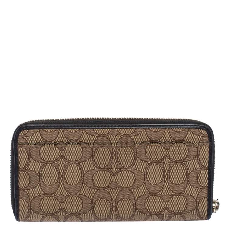 Pre Owned Coach Beige/Brown Signature Canvas and Leather Zip Around Wallet