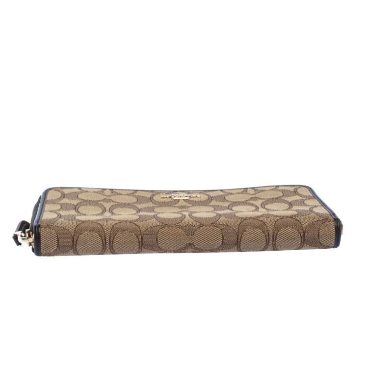 Pre Owned Coach Beige/Brown Signature Canvas and Leather Zip Around Wallet