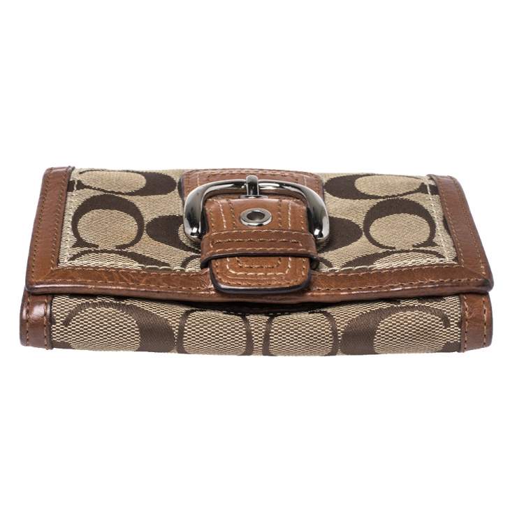 Pre Owned Coach Brown Signature Canvas and Leather Buckle Flap Compact Wallet