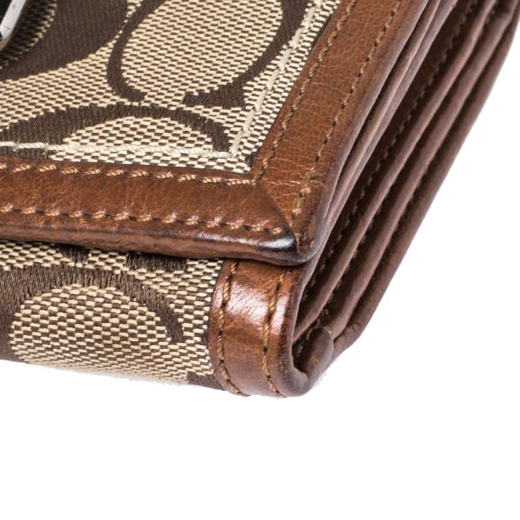 Pre Owned Coach Brown Signature Canvas and Leather Buckle Flap Compact Wallet