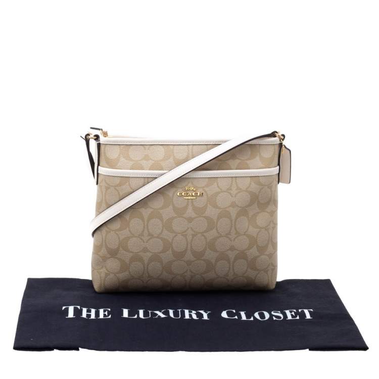 Pre Owned Coach Beige/Cream Signature Coated Canvas and Leather Messenger Bag
