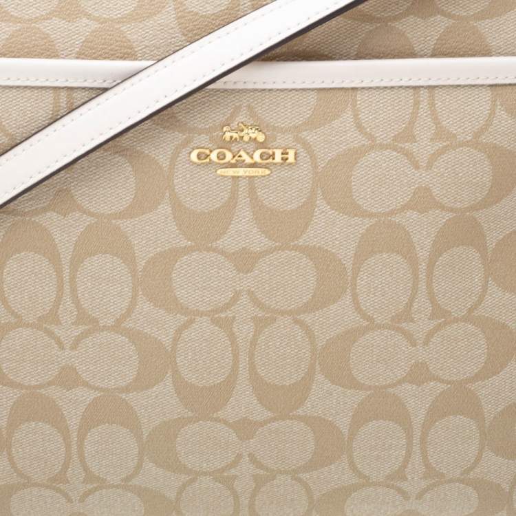 Pre Owned Coach Beige/Cream Signature Coated Canvas and Leather Messenger Bag