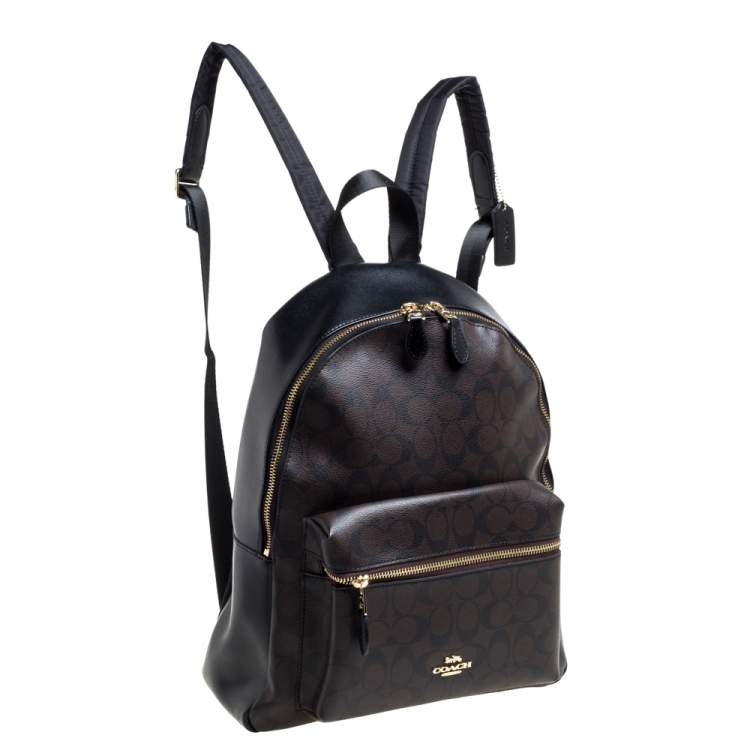 Pre Owned Coach Brown/Black Signature Coated Canvas and Leather Charlie Backpack