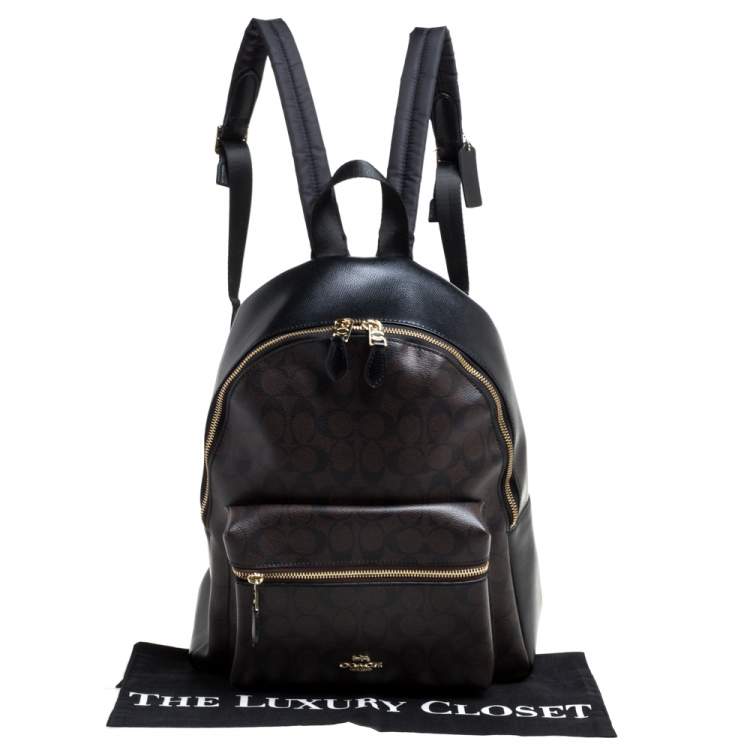 Pre Owned Coach Brown/Black Signature Coated Canvas and Leather Charlie Backpack