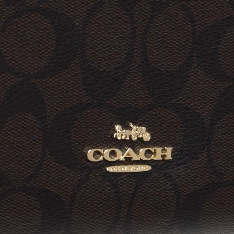 Pre Owned Coach Brown/Black Signature Coated Canvas and Leather Charlie Backpack