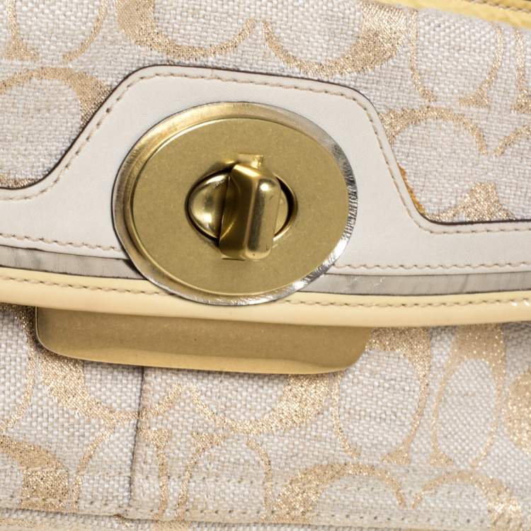 Pre Owned Coach Beige/Cream Signature Canvas and Leather Turnlock Pocket Wristlet Clutch