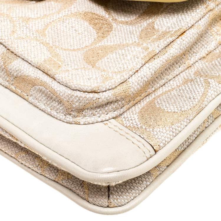 Pre Owned Coach Beige/Cream Signature Canvas and Leather Turnlock Pocket Wristlet Clutch