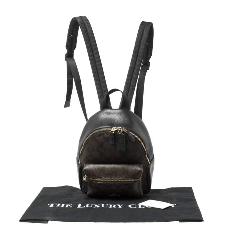 Pre Owned Coach Black/Brown Signature Coated Canvas and Leather Mini Charlie Backpack